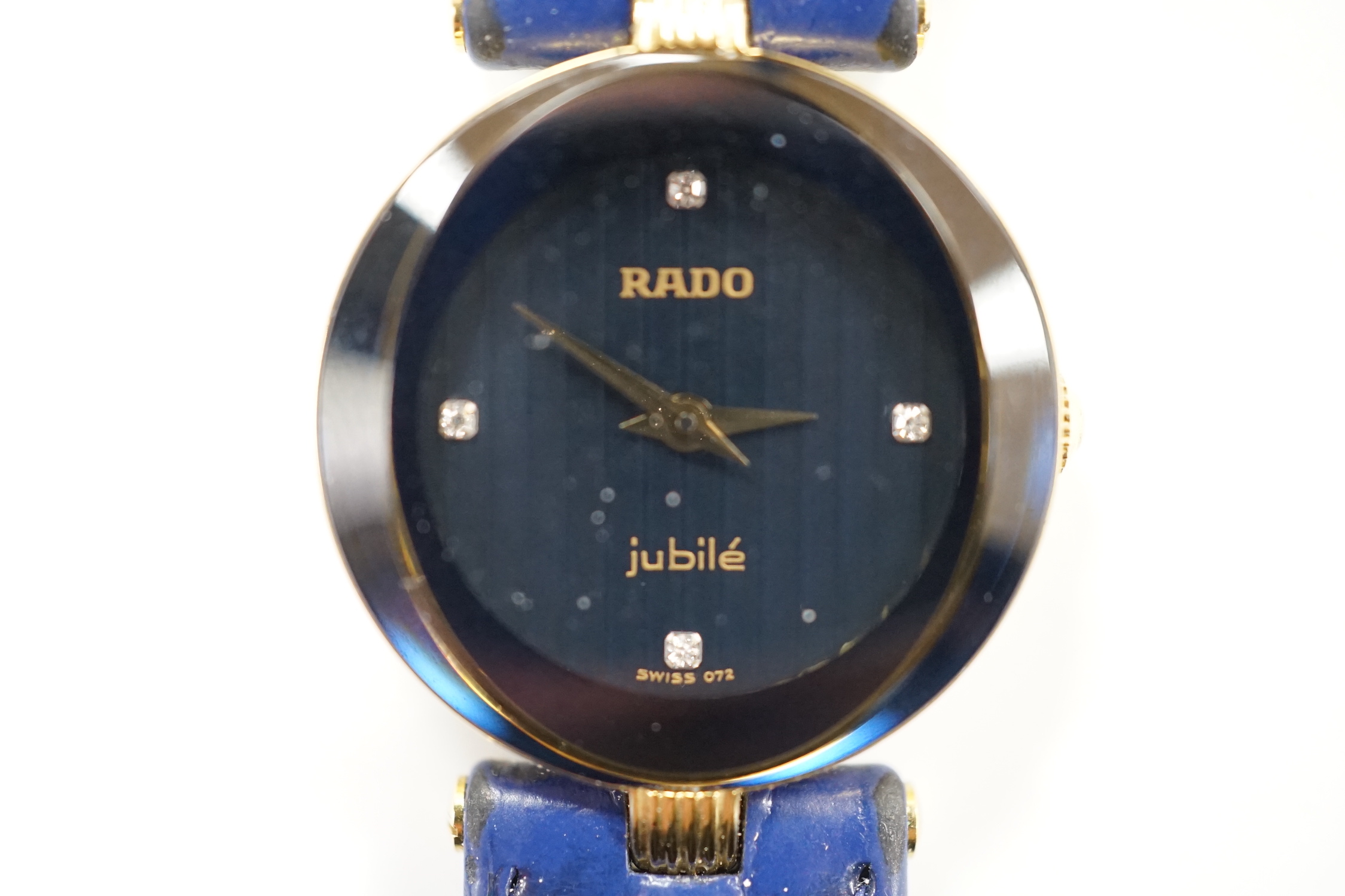 A lady's modern steel and gold plated Rado Jubilé quartz wrist watch, Rado strap and spare black Rado strap, with Rado box.